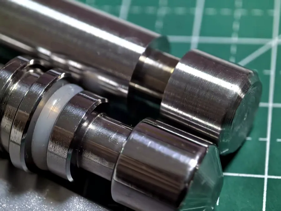 Precision machined steel components with turned and milled features